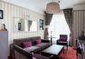 Suite with a large double bed and sofa, with a summer terrace: Photo 5