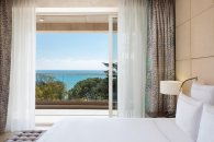 Signature Suite, sea view -  king bed and sofa: Photo 5