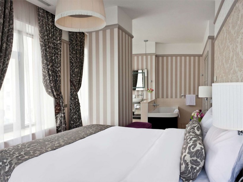 Superior Suite with a large double bed and Sofa
