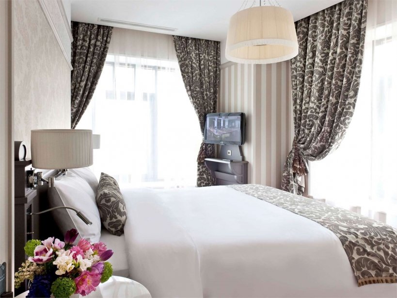Family Suite with a large double bed and sofa