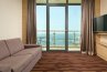 Suite Room with a Balcony and sea View - with a large double bed and sofa: Photo 6